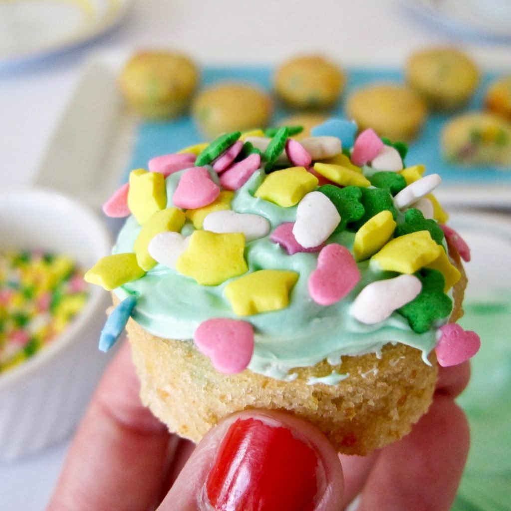 Let party guests decorate their own mini cupcakes. Using the recipe from our party guide, we baked these in mini muffin pans. Provide a bowl of frosting and plenty of sprinkles. Tipping the cupcake upside down, swirl in a bowl of frosting. Remove and dip in a bowl of sprinkles.