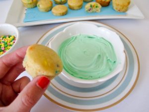 Let party guests decorate their own mini cupcakes. Using the recipe from our party guide, we baked these in mini muffin pans. Provide a bowl of frosting and plenty of sprinkles. Tipping the cupcake upside down, swirl in a bowl of frosting. Remove and dip in a bowl of sprinkles.