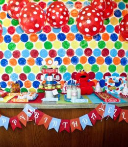 You can create a simple, cost-effective dessert table for your party anywhere with these 5 simple steps! We set up this Elmo party on a kitchen island.