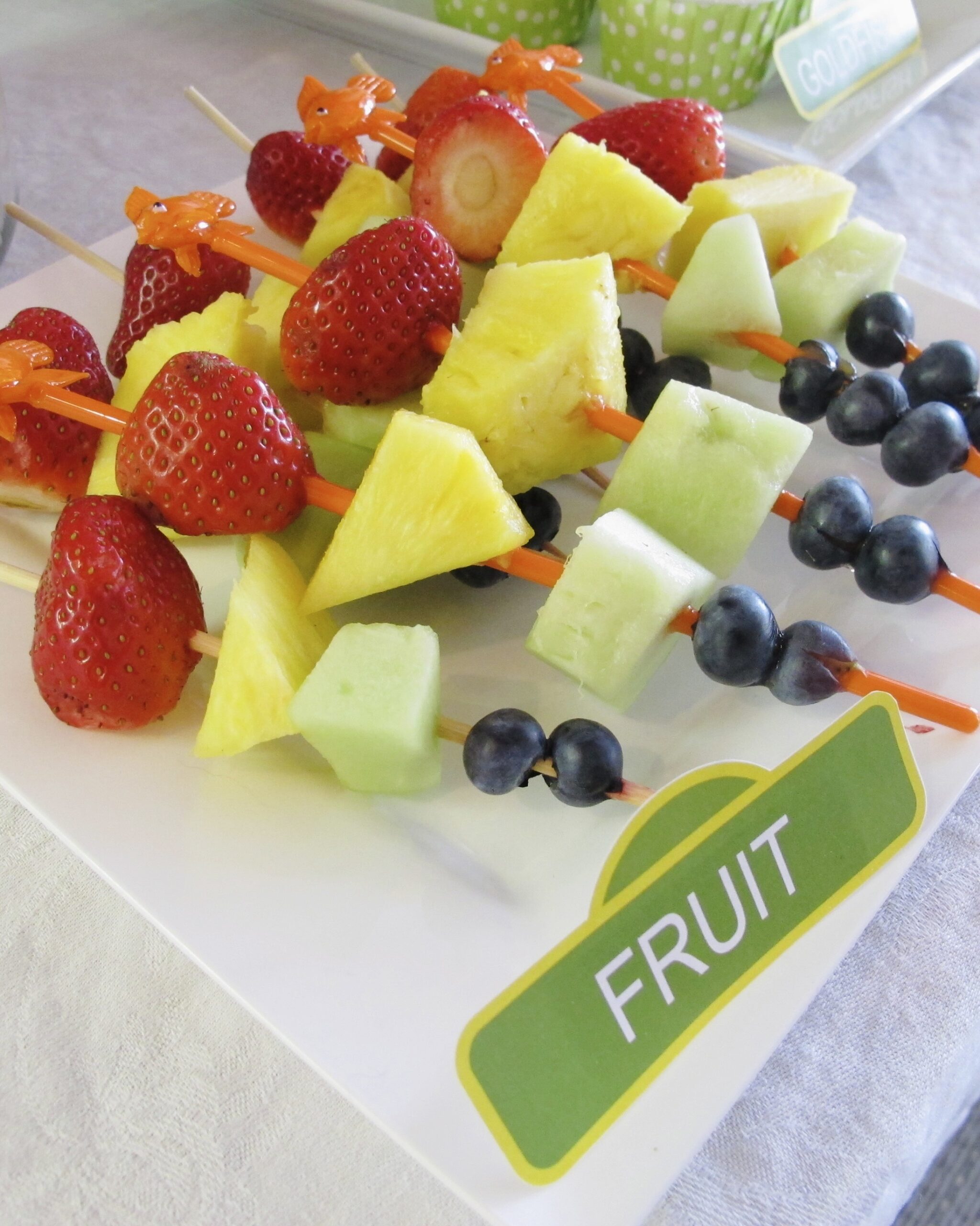Abby’s Magic Wands fruit kabobs served on a party tray