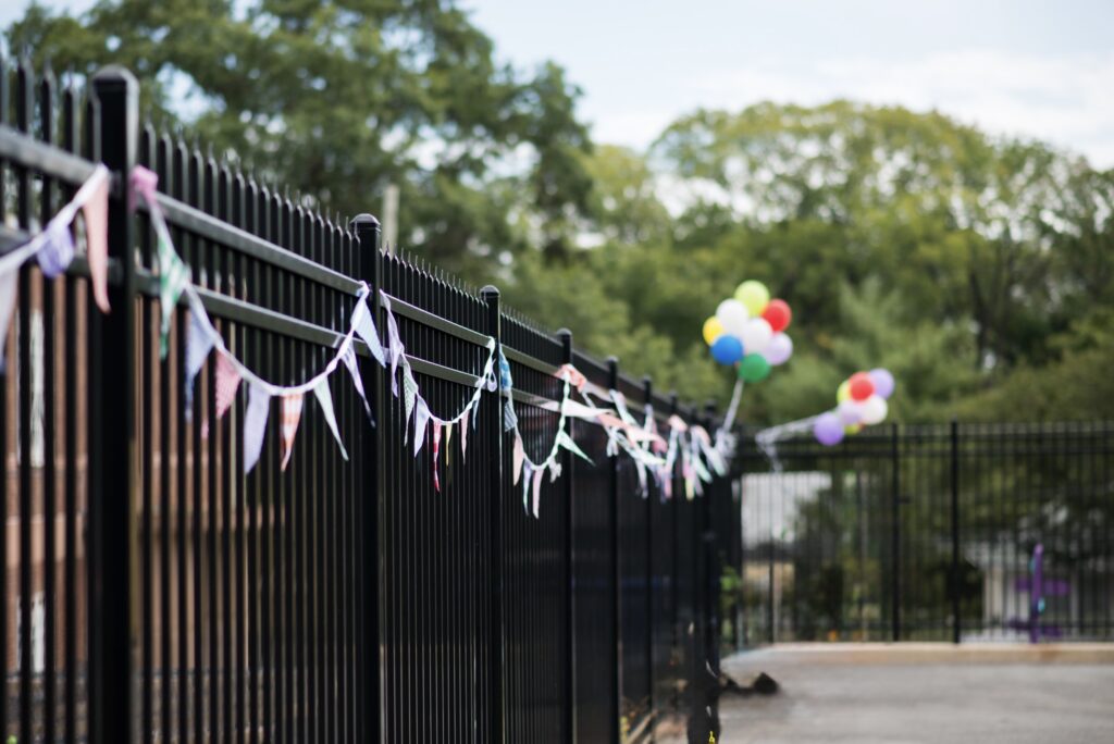 Church Neighborhood Grand Launch Picnic with picnic blankets and balloons. Yard games, chipotle, and cupcakes to celebrate grand opening.